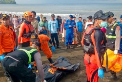 Indonesia suspends search for 30 missing after ferry sinks near Bali