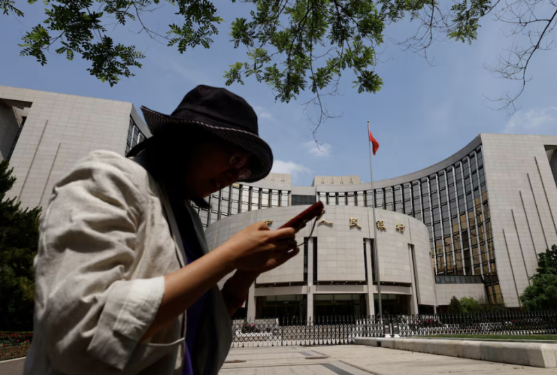 China leaves benchmark lending rates unchanged, matching forecast